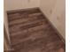 Close-up of newly installed wood-look flooring, enhancing the room's aesthetic appeal at 4284 Parkdale Ave, Las Vegas, NV 89121