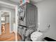 Stainless steel stacked washer and dryer in the laundry room at 4284 Parkdale Ave, Las Vegas, NV 89121