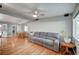 Spacious living room featuring hardwood floors, neutral paint, ceiling fan, and recessed lighting at 4284 Parkdale Ave, Las Vegas, NV 89121