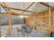 Outdoor patio area with seating, wooden pergola, and a concrete patio at 4284 Parkdale Ave, Las Vegas, NV 89121