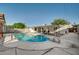 Backyard with a pool and covered patio featuring a seating area at 4284 Parkdale Ave, Las Vegas, NV 89121