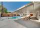 An outdoor pool featuring a diving board and patio area at 4284 Parkdale Ave, Las Vegas, NV 89121