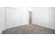 Cozy bedroom with plush carpet flooring, closet, and fresh paint at 4410 E Brusca Way, Pahrump, NV 89061