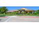 Charming clubhouse featuring arched entrances, stone accents, well-kept lawns and professional landscaping at 4410 E Brusca Way, Pahrump, NV 89061