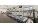 Bright fitness center featuring rows of treadmills, exercise equipment, TVs and natural light at 4410 E Brusca Way, Pahrump, NV 89061