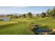 Picturesque golf course with a flowing stream, sand traps, and mountain views at 4410 E Brusca Way, Pahrump, NV 89061