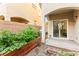The spacious backyard features a garden and patio with easy access to the home at 4533 Lime Straight Dr, Las Vegas, NV 89115