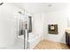 Bright bathroom featuring a shower, soaking tub, and a window offering natural light at 4533 Lime Straight Dr, Las Vegas, NV 89115