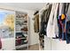 Walk-in closet with shelves and hanging space, offering ample storage solutions at 4533 Lime Straight Dr, Las Vegas, NV 89115