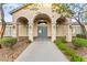 Community clubhouse with welcoming entrance, landscaping, and ample parking at 4533 Lime Straight Dr, Las Vegas, NV 89115