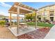 A beautiful common area with picnic tables, seating, and grill at 4533 Lime Straight Dr, Las Vegas, NV 89115