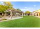 Well-maintained common area with picnic pavilions, landscaping, and grass at 4533 Lime Straight Dr, Las Vegas, NV 89115