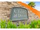 Stone monument sign for Cliffs at Dover, a Beazer Homes community with lush green landscaping at 4533 Lime Straight Dr, Las Vegas, NV 89115
