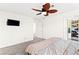 Relaxing main bedroom featuring a ceiling fan and an attached closet for extra storage at 4533 Lime Straight Dr, Las Vegas, NV 89115