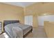 Bright bedroom with carpeted floors and double door closets at 4770 Topaz St # 108, Las Vegas, NV 89121