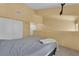Upstairs bedroom with carpeted floors and mounted television bracket at 4770 Topaz St # 108, Las Vegas, NV 89121