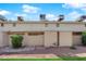 Exterior view of condo building with well-maintained landscaping at 4770 Topaz St # 108, Las Vegas, NV 89121