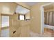 Upstairs hallway leading to a bathroom with a shower over the bath at 4770 Topaz St # 108, Las Vegas, NV 89121