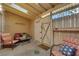 Cozy patio area with chairs and a table, with an outdoor entrance gate at 4770 Topaz St # 108, Las Vegas, NV 89121