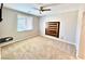 Spacious bedroom with natural light, ceiling fan, and neutral decor at 5019 Quiet Falls Ct, Las Vegas, NV 89141