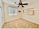 Cozy bedroom offers natural light and minimalist floating shelves at 5019 Quiet Falls Ct, Las Vegas, NV 89141