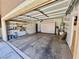 Spacious garage offering ample storage and shelving units at 5019 Quiet Falls Ct, Las Vegas, NV 89141