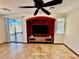 Bright living room with recessed display, patio door, and a ceiling fan at 5019 Quiet Falls Ct, Las Vegas, NV 89141