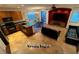 This is an open concept space with an island, dining area, and entertainment center at 5019 Quiet Falls Ct, Las Vegas, NV 89141