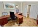 A bright office space featuring ample desk space and natural lighting at 5019 Quiet Falls Ct, Las Vegas, NV 89141