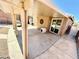 Covered patio featuring a built-in grill and ample seating space at 5019 Quiet Falls Ct, Las Vegas, NV 89141