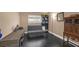 Functional bedroom features dark floors, neutral walls, and natural light at 5021 Apache Valley Ave, Las Vegas, NV 89131