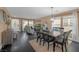 Bright living room featuring a dining area, sleek floors, and ample natural light at 5021 Apache Valley Ave, Las Vegas, NV 89131