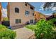 A spacious backyard features a putting green, BBQ, and a brick patio, perfect for outdoor enjoyment and entertaining at 5448 Tulip Hill Ave, Las Vegas, NV 89141