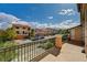 Charming balcony view of neighboring homes, showcasing the community's attractive streetscape and peaceful setting at 5448 Tulip Hill Ave, Las Vegas, NV 89141