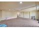 Large basement with plush carpeting, recessed lighting, and flexible layout for entertainment or storage at 5448 Tulip Hill Ave, Las Vegas, NV 89141