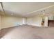 Finished basement with neutral decor and carpet, offering plenty of room for activities and storage at 5448 Tulip Hill Ave, Las Vegas, NV 89141