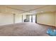 Expansive basement boasts neutral tones, recessed lighting, and walk-out access to the backyard at 5448 Tulip Hill Ave, Las Vegas, NV 89141