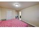 Bedroom with a door that allows access to the bathroom and other rooms at 5448 Tulip Hill Ave, Las Vegas, NV 89141