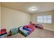 Bedroom with a window for natural light and colorful furniture suitable for a bedroom at 5448 Tulip Hill Ave, Las Vegas, NV 89141