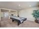 Game room features pool table and is adjacent to living areas at 5448 Tulip Hill Ave, Las Vegas, NV 89141