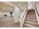Carpeted stairs leading to the main floor of the home at 5448 Tulip Hill Ave, Las Vegas, NV 89141