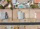 A top-down view showcases a home's layout and backyard with an inviting pool at 5449 Hickory Tree St, Las Vegas, NV 89149
