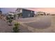 An expansive backyard featuring a unique landscape design, perfect for outdoor enjoyment at 5449 Hickory Tree St, Las Vegas, NV 89149