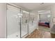 Bathroom with tiled walk-in shower and a separate soaking tub at 5449 Hickory Tree St, Las Vegas, NV 89149