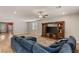 Spacious living room with hardwood floors and an open layout, perfect for entertaining and relaxing at 5449 Hickory Tree St, Las Vegas, NV 89149