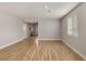 Spacious living room with hardwood floors and neutral walls, offering a bright and airy feel at 5449 Hickory Tree St, Las Vegas, NV 89149