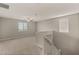 Cozy upstairs loft space with neutral carpet and ample natural light at 5449 Hickory Tree St, Las Vegas, NV 89149