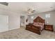 Main bedroom features a decorative bed frame and ensuite bathroom at 5449 Hickory Tree St, Las Vegas, NV 89149