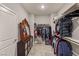 Walk-in closet with custom shelving and ample storage space at 5449 Hickory Tree St, Las Vegas, NV 89149
