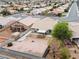 Birds-eye view showcasing a home's backyard with desert landscaping, and surrounding neighborhood at 556 Decidedly St, Henderson, NV 89015